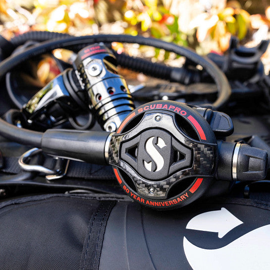Lifestyle image showcasing the anniversary regulator mounted on dive gear
