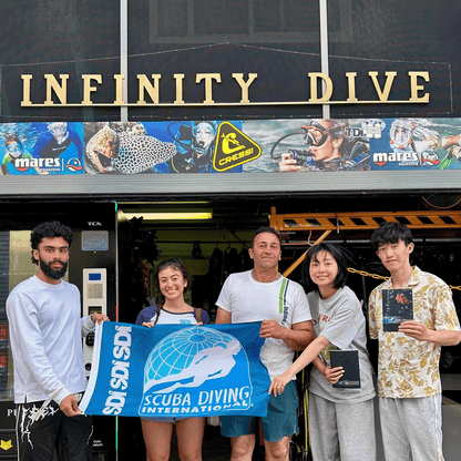 Infinity Dive students celebrating their SDI Open Water Diver graduation in Sydney.